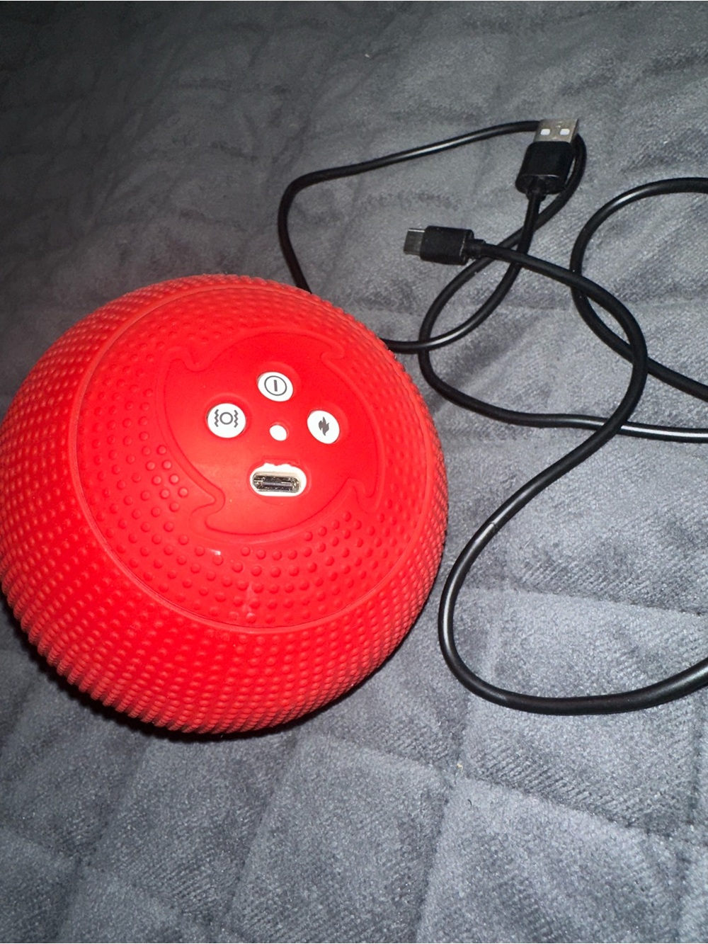 Heating vibrating massage ball